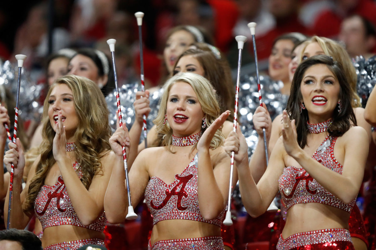 Alabama cheerleaders performing during a game.