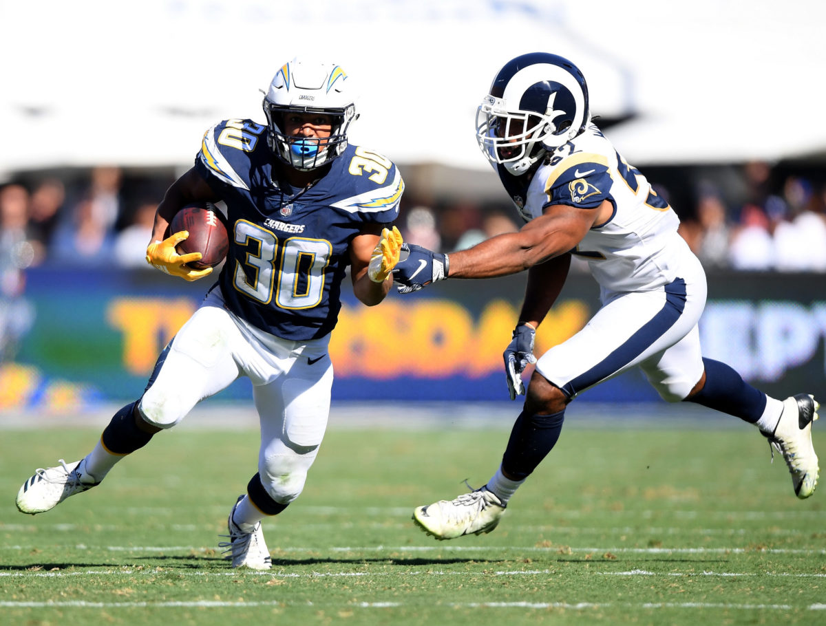 Los Angeles Chargers back Austin Ekeler rushes against the Rams.