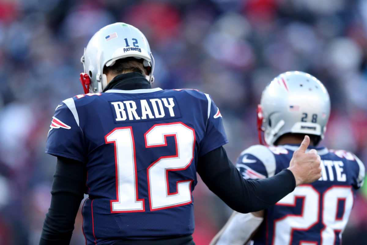 New England Patriots quarterback Tom Brady and James White.