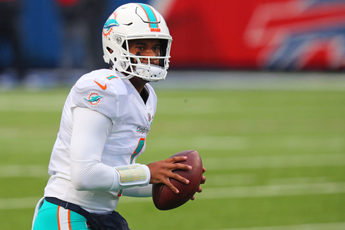 Tua Tagovailoa looks to pass for the Dolphins.