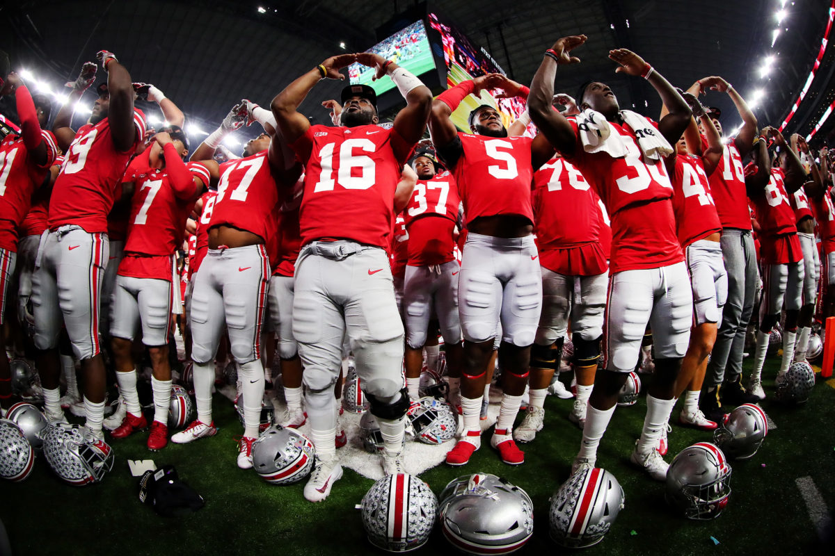 Ohio State football players celebrating after a game.