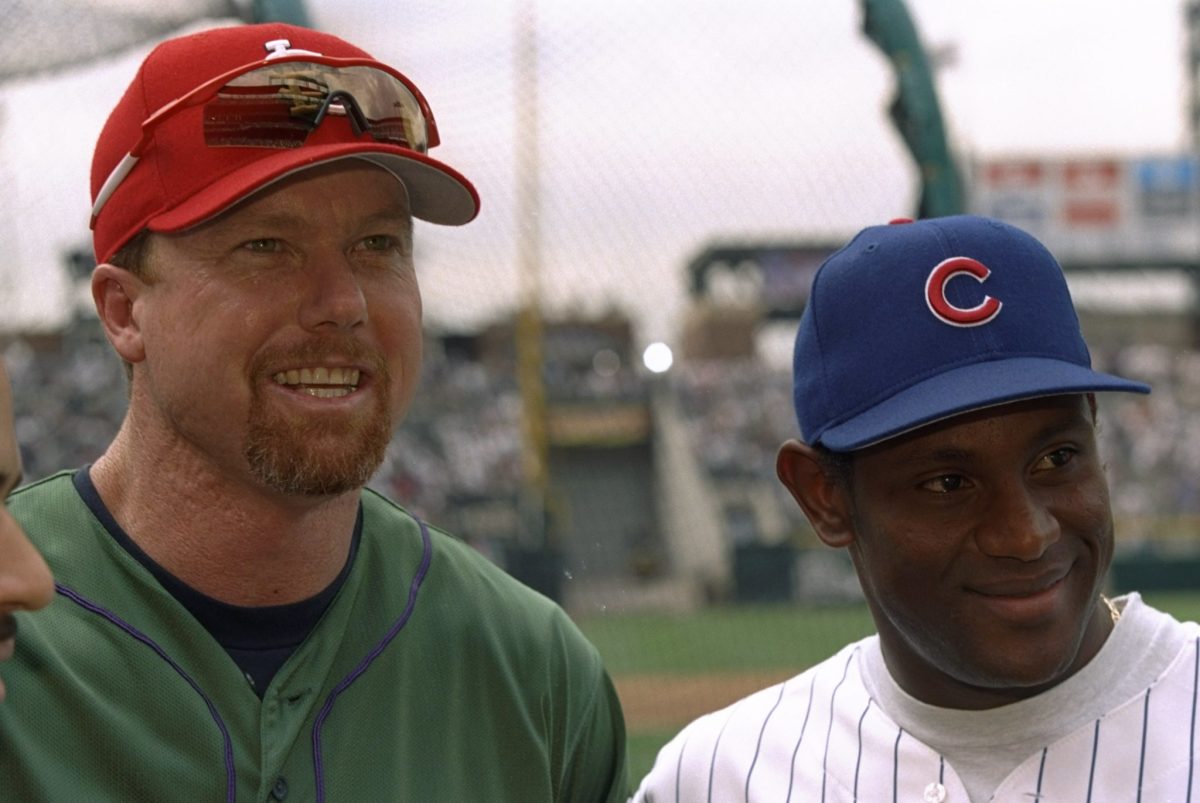 Mark McGwire posing for a photo with Sammy Sosa.