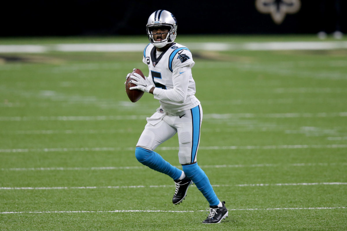 Teddy Bridgewater rolls out for the Carolina Panthers.