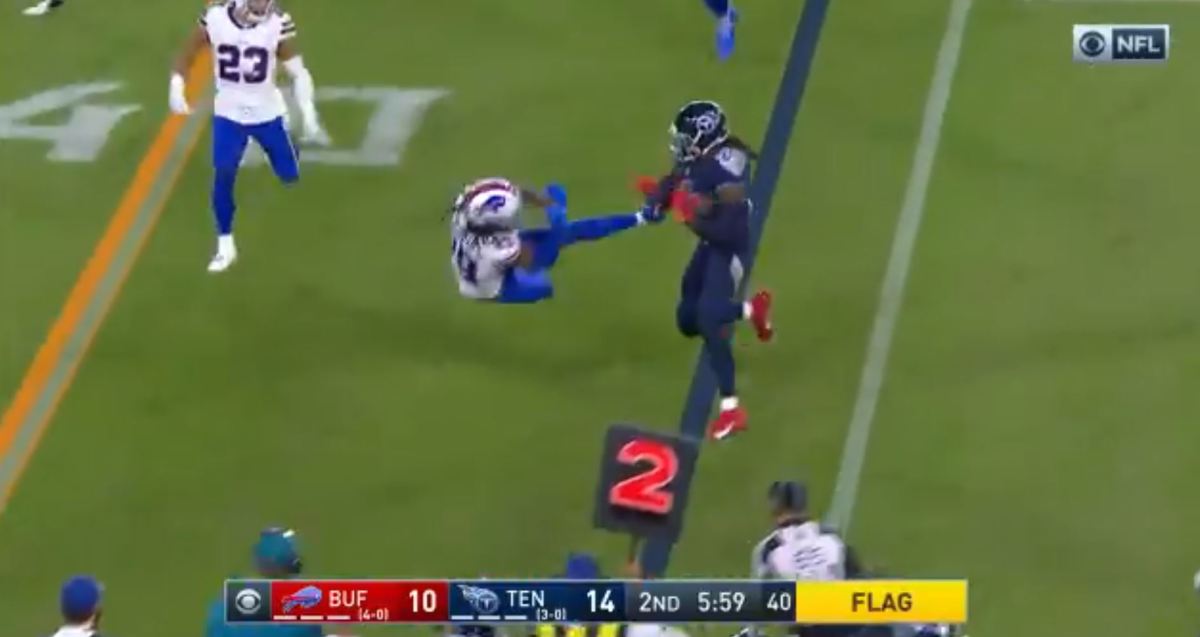 Derrick Henry tosses Josh Norman down during Bills-Titans game