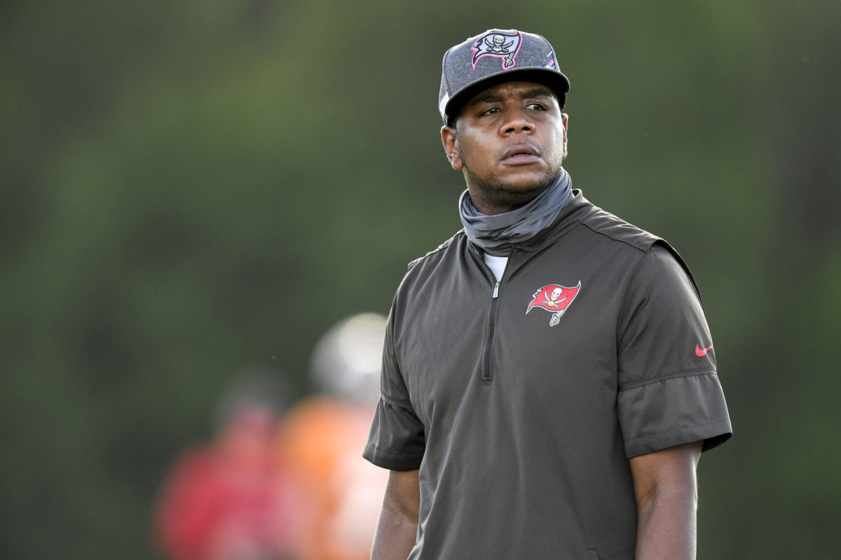 Tampa Bay offensive coordinator Byron Leftwich looks off to his left.