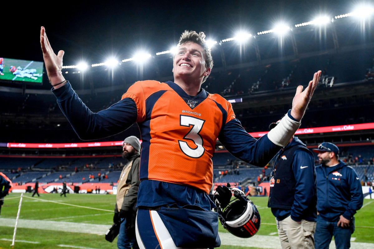 Drew Lock celebrates a win for the Broncos.