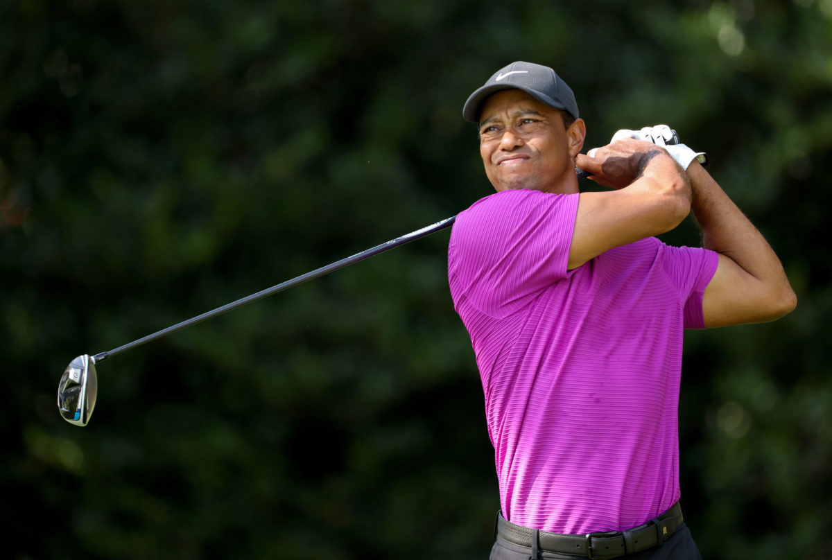 Tiger Woods of the United States plays his shot