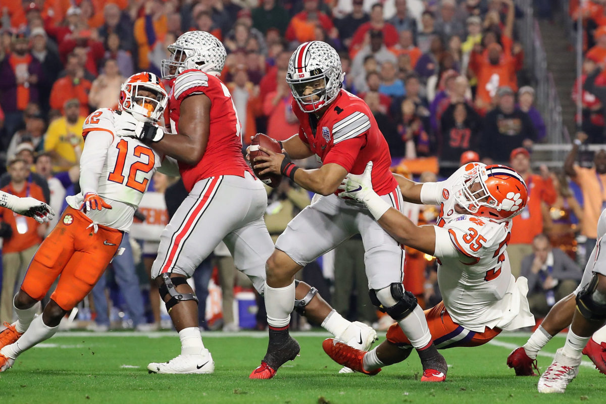 Ohio State's Justin Fields runs the ball against Clemson in the College Football Playoff.