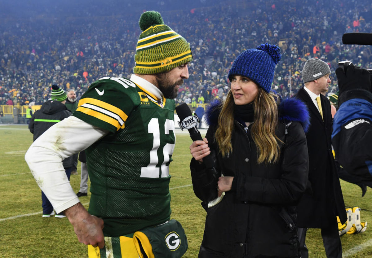 Erin Andrews interviews Aaron Rodgers after a game.