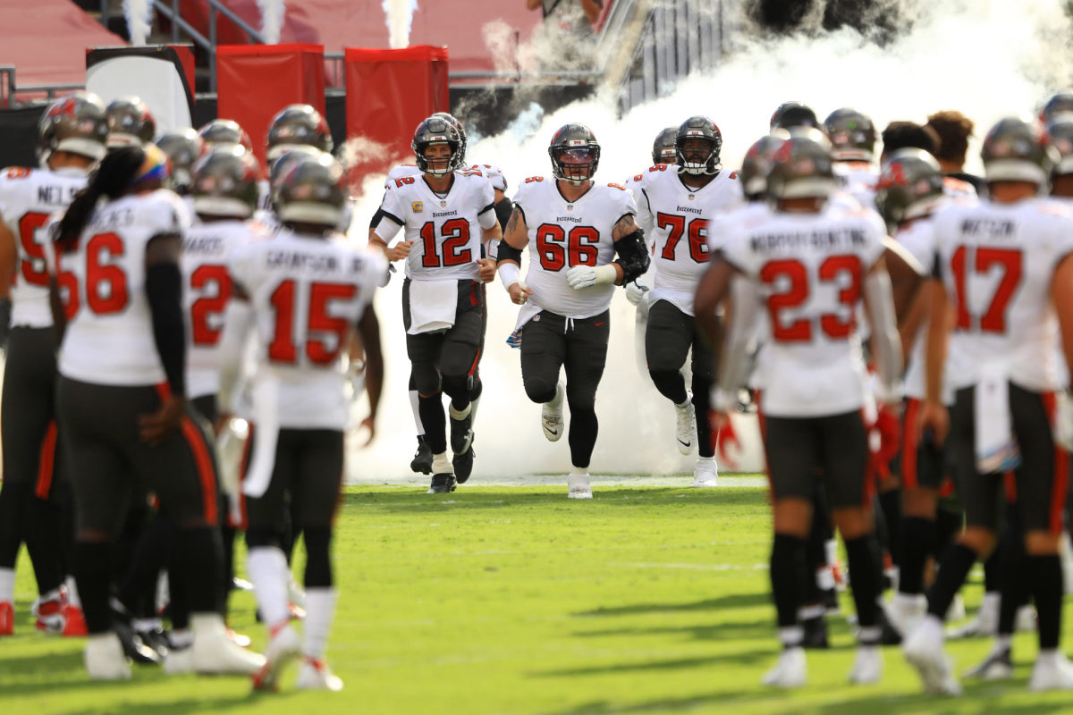 The Tampa Bay Buccaneers run onto the field.