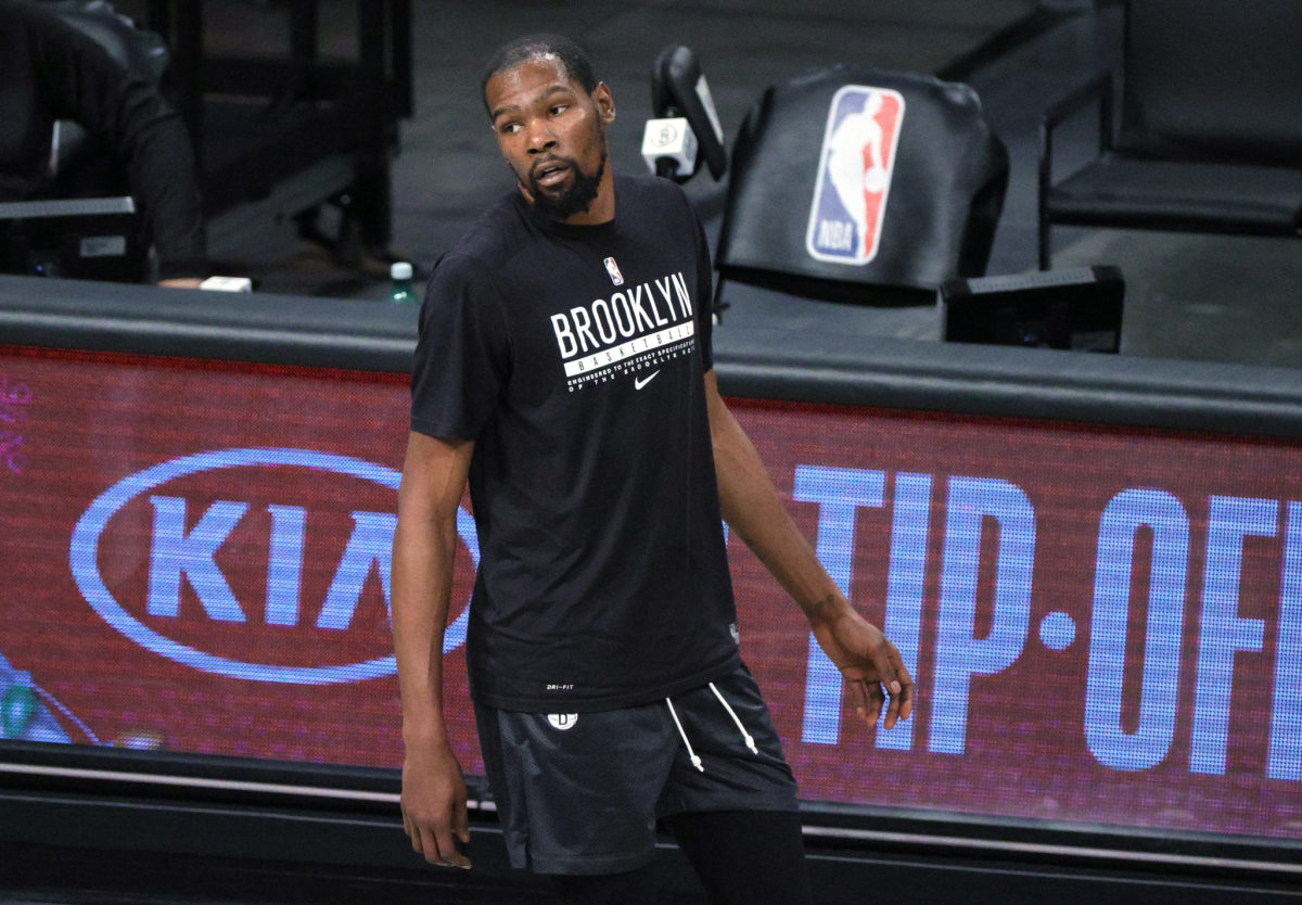 Kevin Durant warms up before a game.