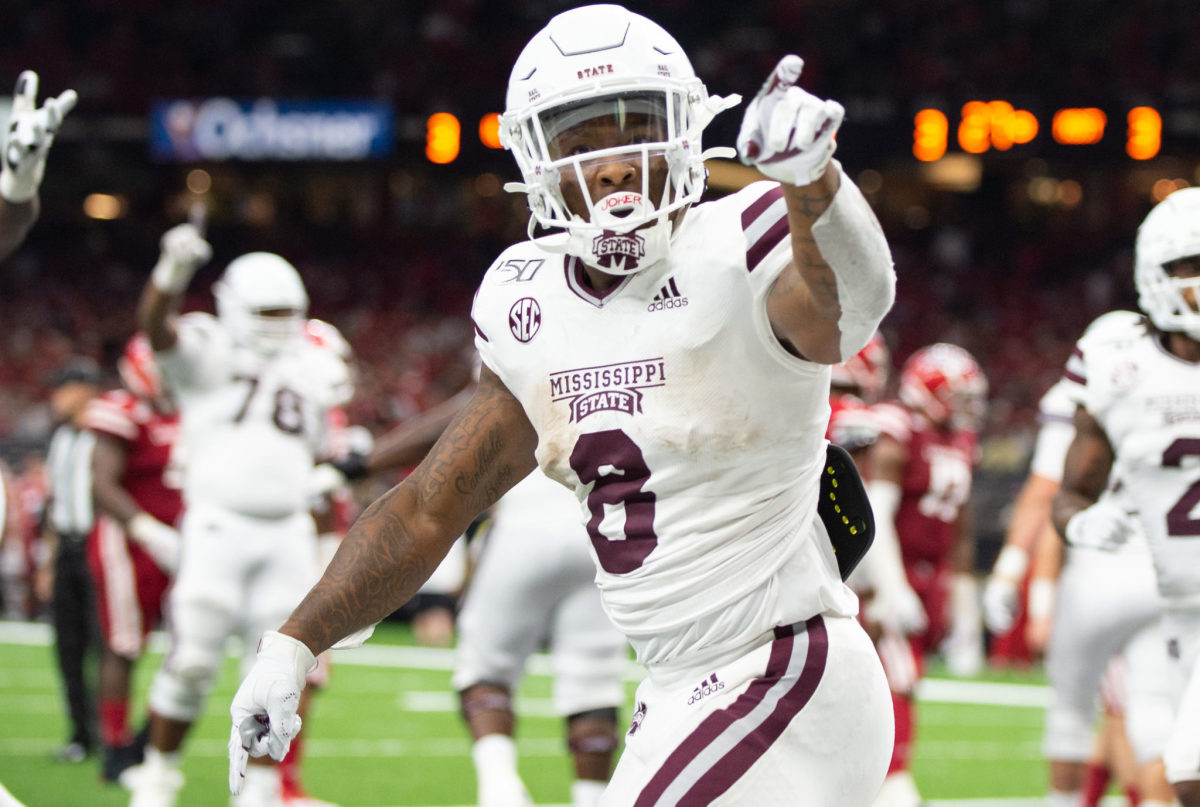 Mississippi State running back Kylin Hill celebrates a touchdown.