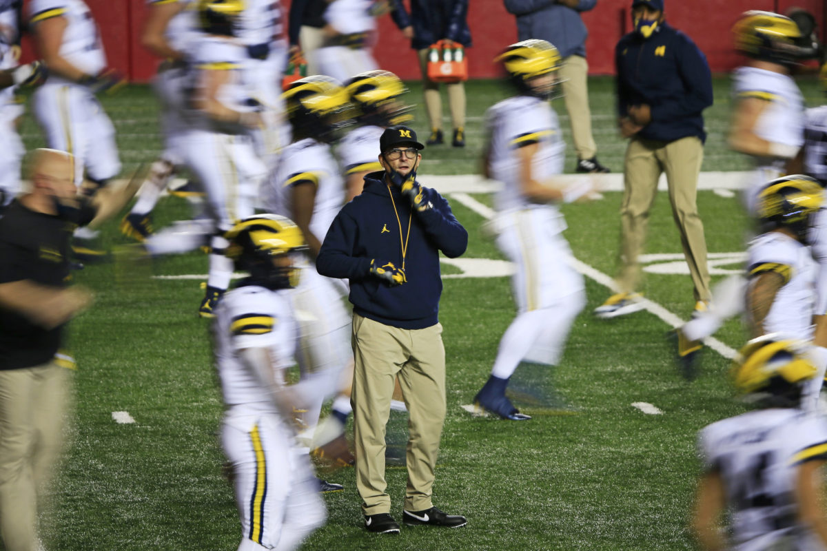 Jim Harbaugh on the field at Rutgers.
