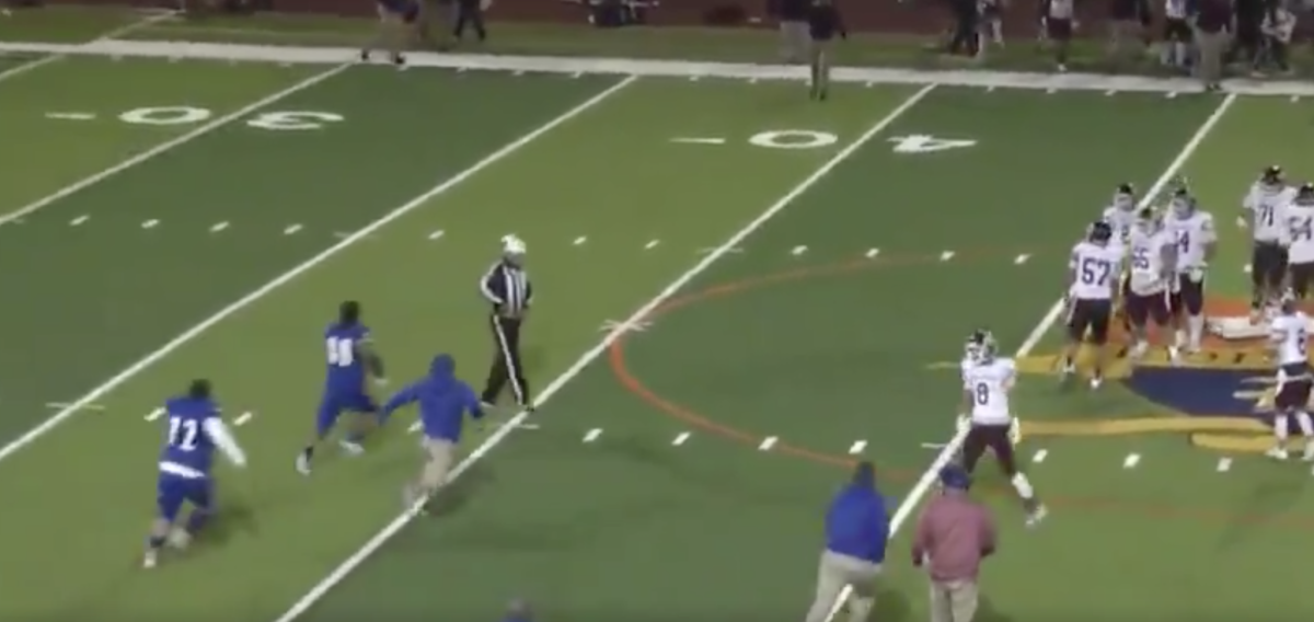 Texas high school football player tackles a ref.