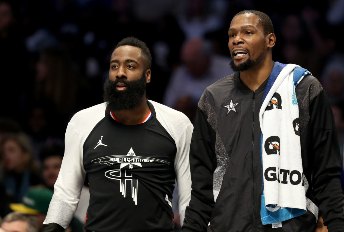 Brooklyn Nets stars Kevin Durant and James Harden stand together.