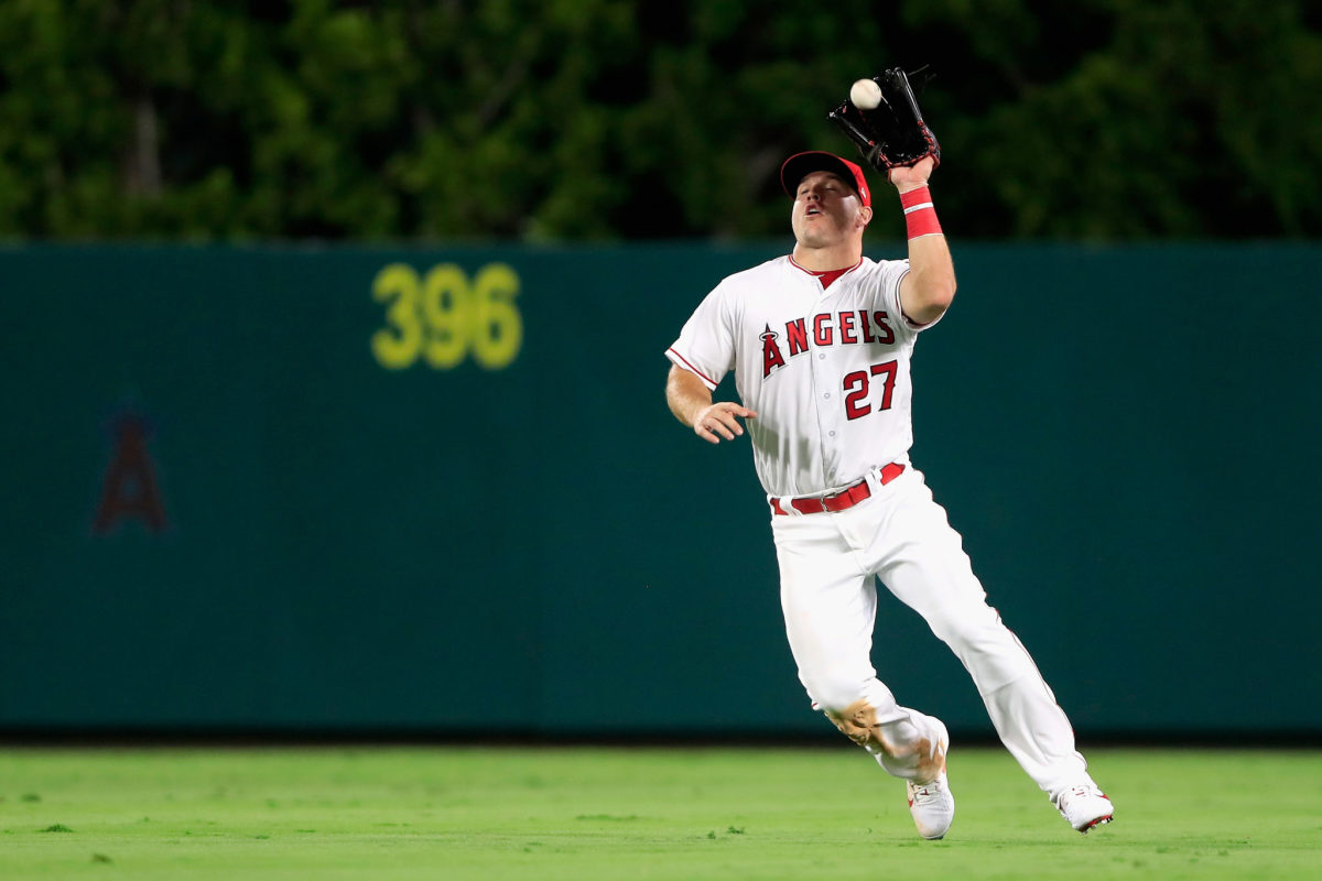 Mike Trout catching a fly ball.