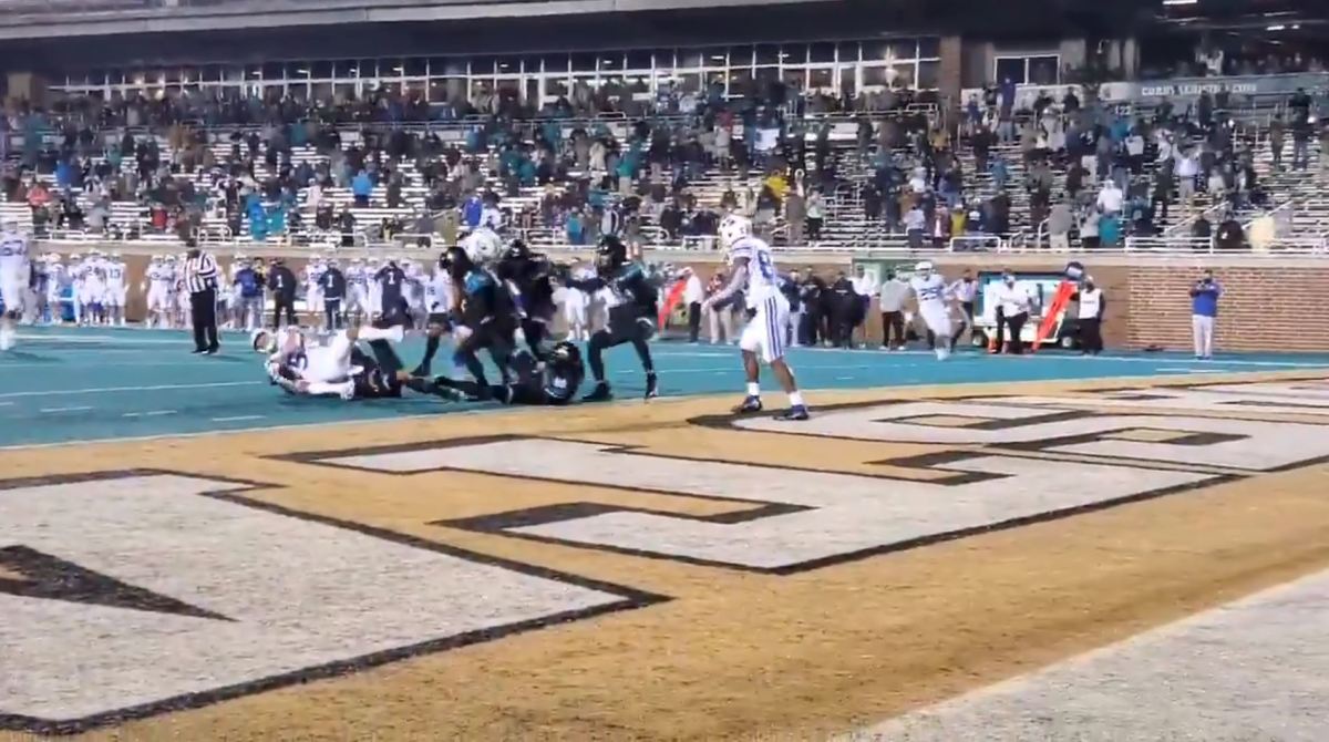 BYU receiver Dax Milne is taken down by Coastal Carolina safety Mateo Sudipo at the 1 yard line to seal a dramatic win for the undefeated Chanticleers.