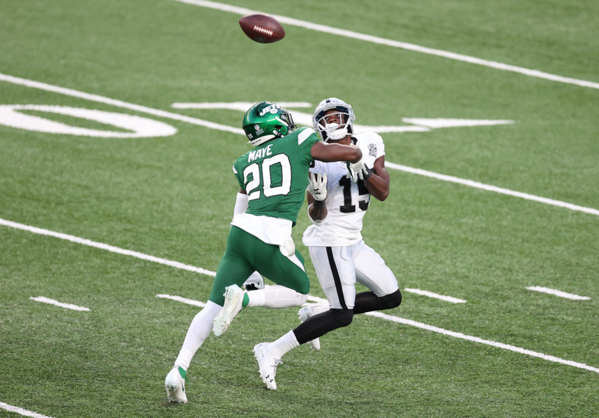 Jets safety Marcus Maye breaks up a pass intended for a Raiders receiver.