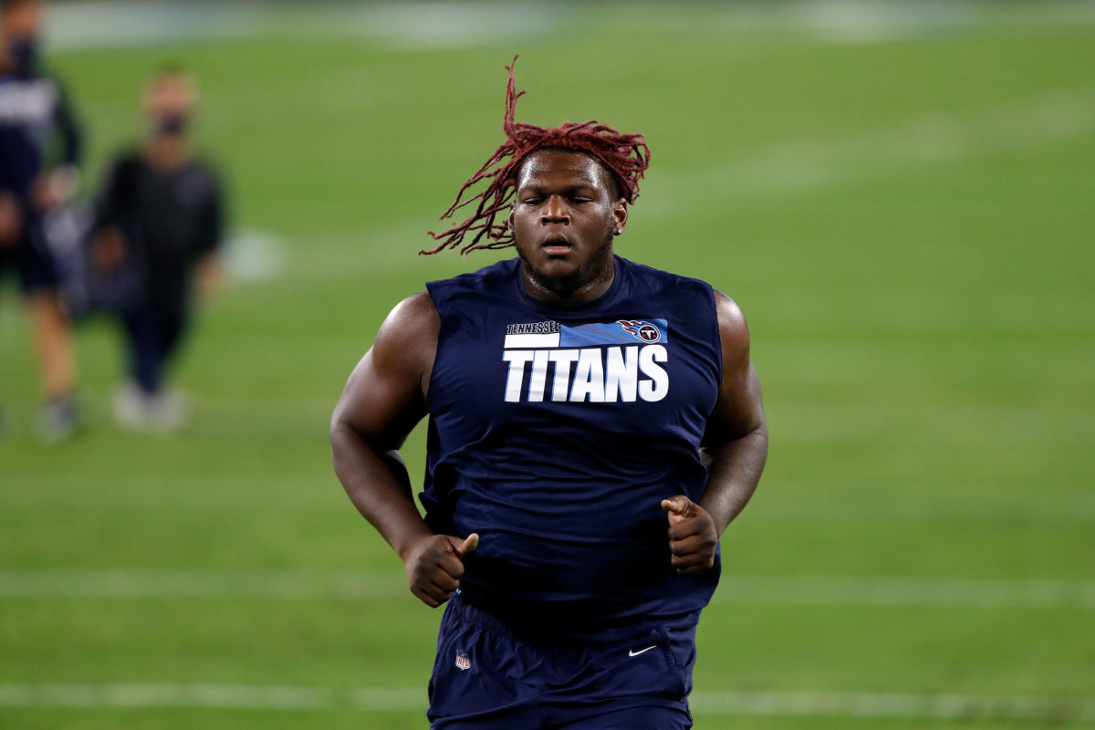 Isaiah Wilson warms up for the Tennessee Titans.