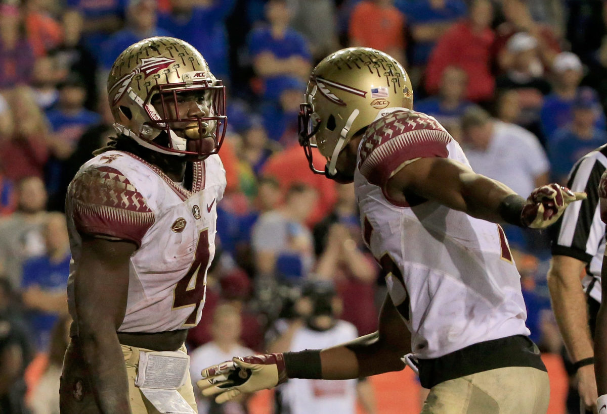 Dalvin Cook and Travis Rudolph celebrating a Florida State touchdown.