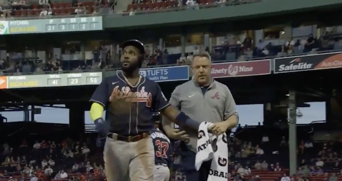 Marcell Ozuna leaves the game after a hand injury.