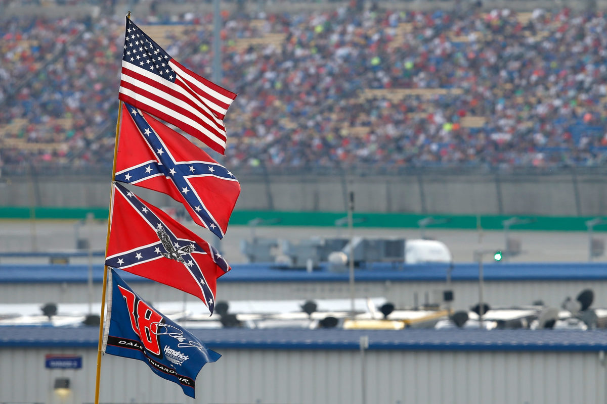 Confederate flags are flown at NASCAR event.