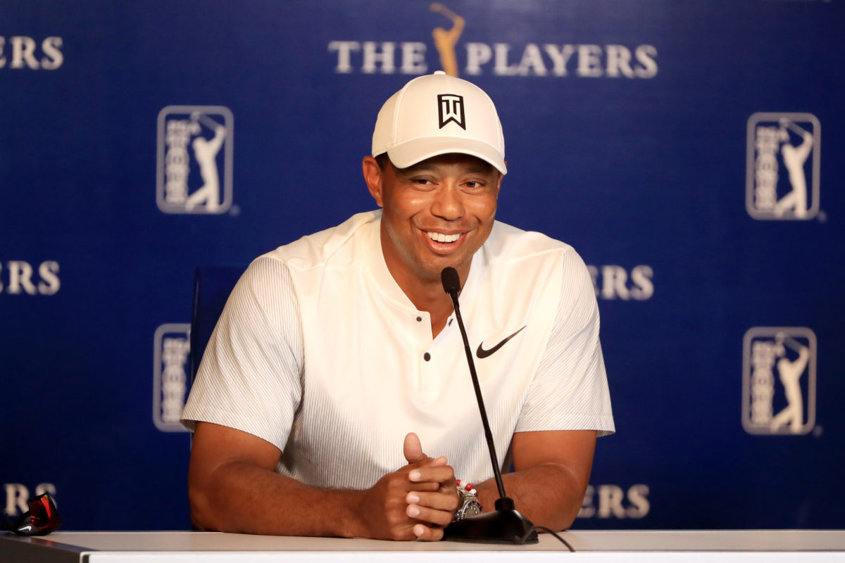 Tiger Woods smiling.
