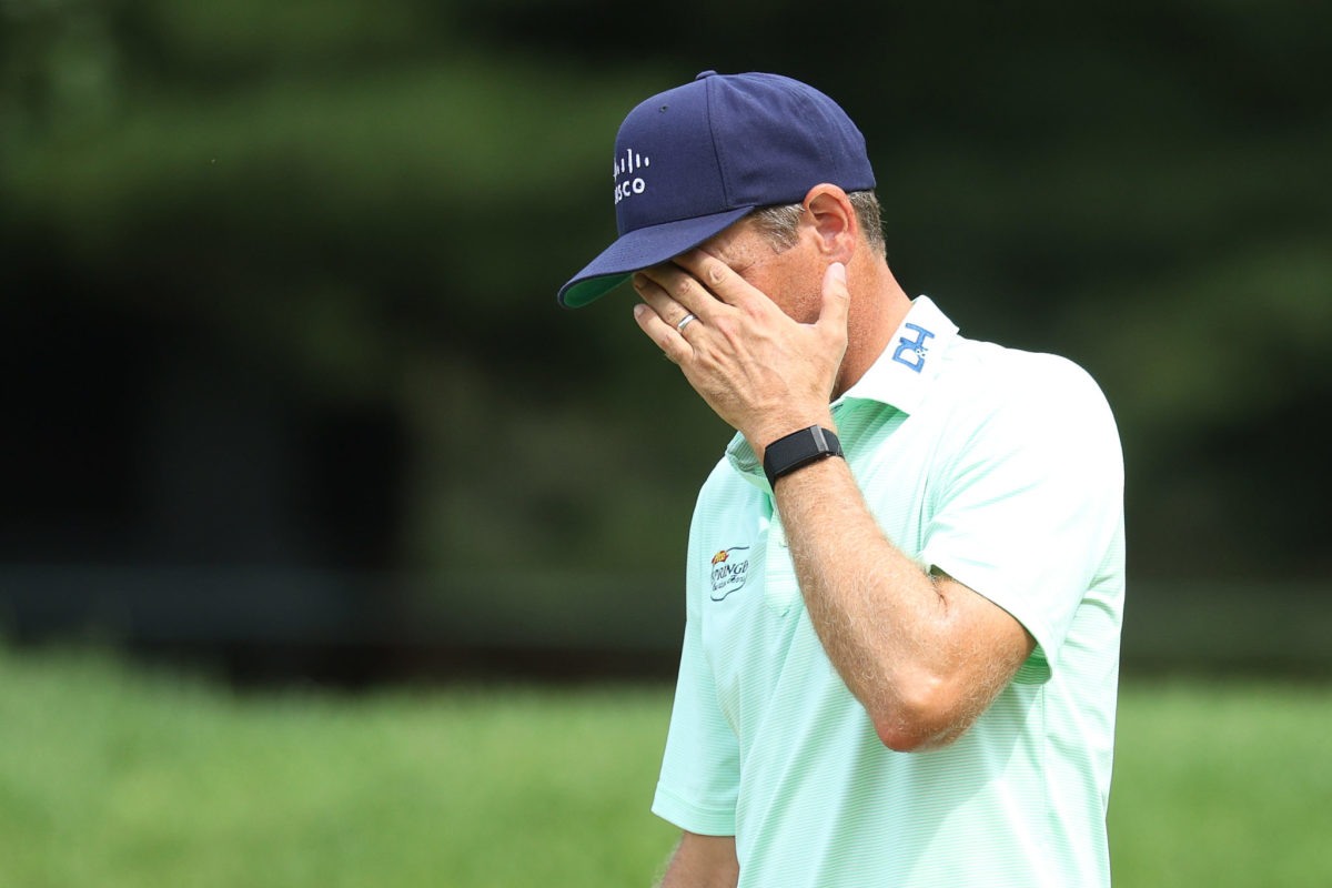 Brendon Todd reacts to a bad hole during a golf tournament.