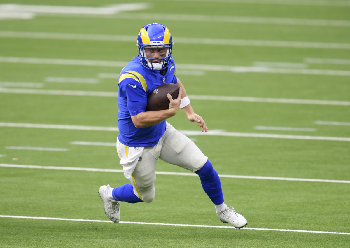 Los Angeles Rams quarterback John Wolford runs.