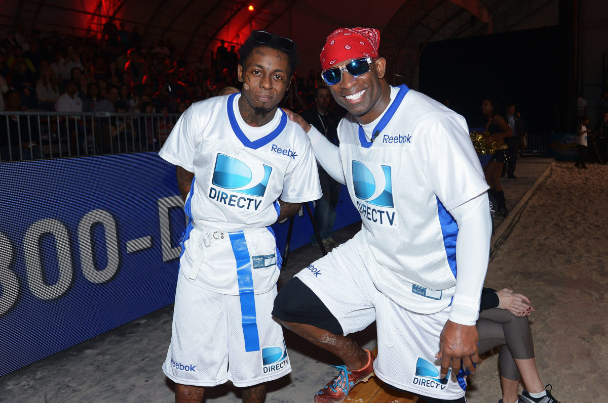 Deion Sanders and Lil Wayne at a celebrity Super Bowl week event.