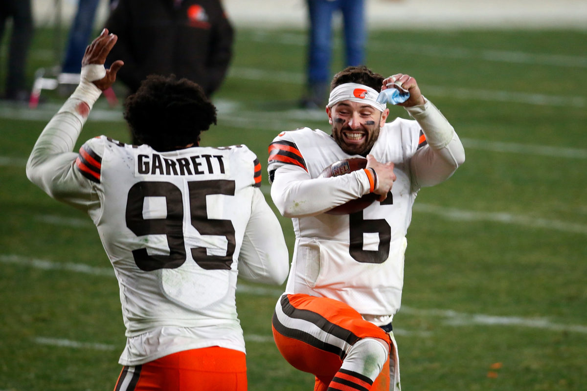 Cleveland Browns stars Baker Mayfield and Myles Garrett on the field.