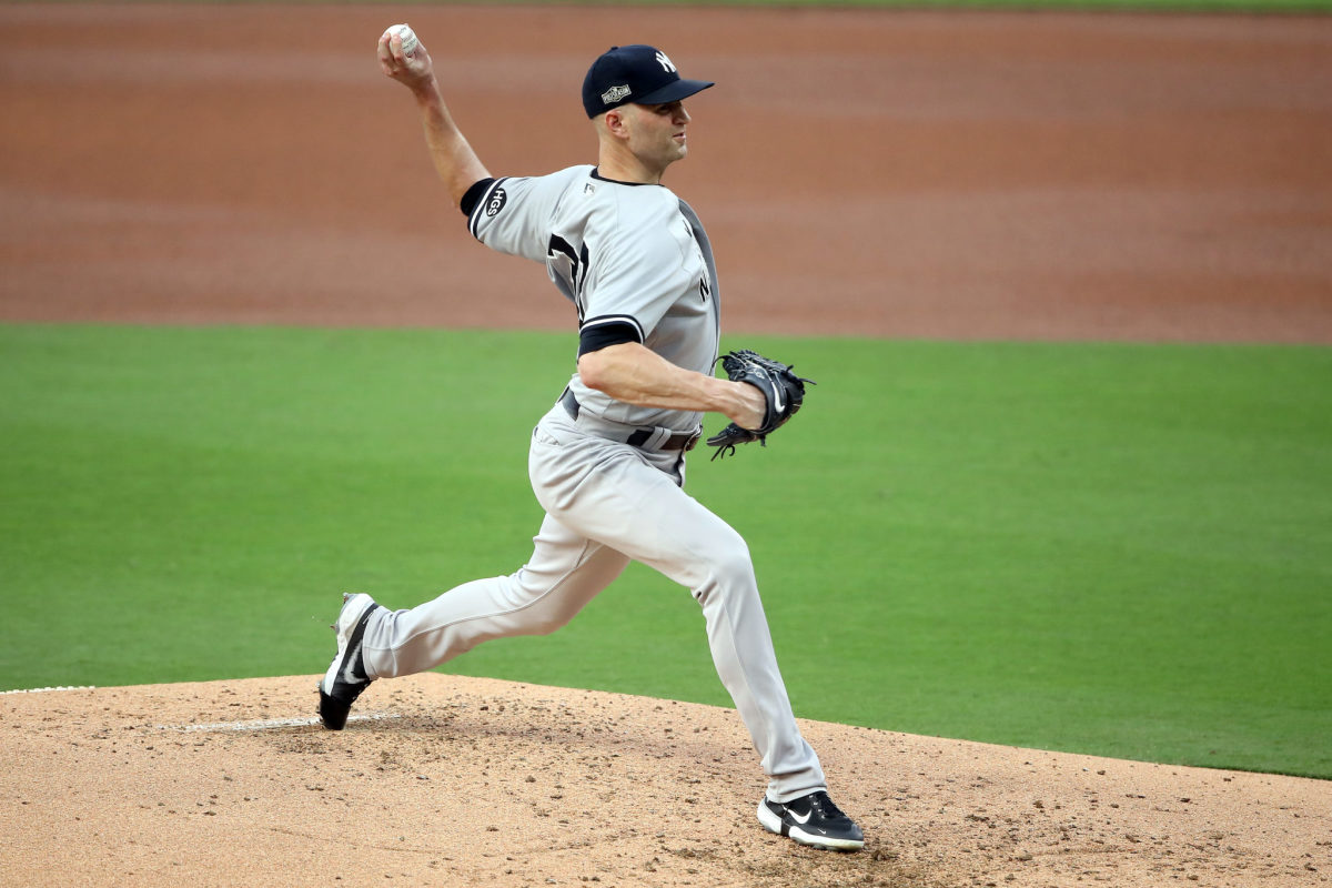 J.A. Happ throws a pitch in a game for the Yankees.