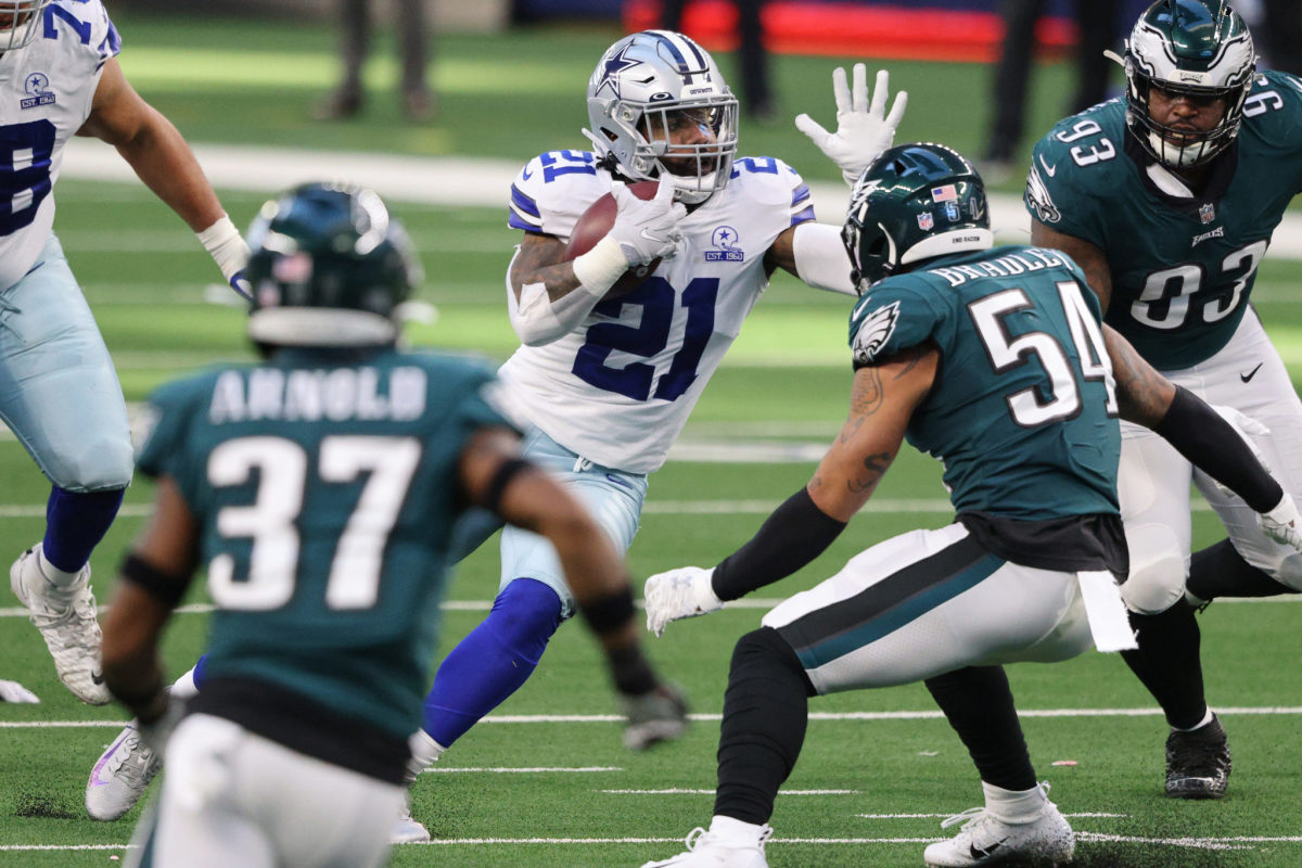 September 30, 2018: Dallas Cowboys running back Ezekiel Elliott #21 during  an NFL football game between the Detroit Lions and the Dallas Cowboys at  AT&T Stadium in Arlington, TX Dallas defeated Detroit