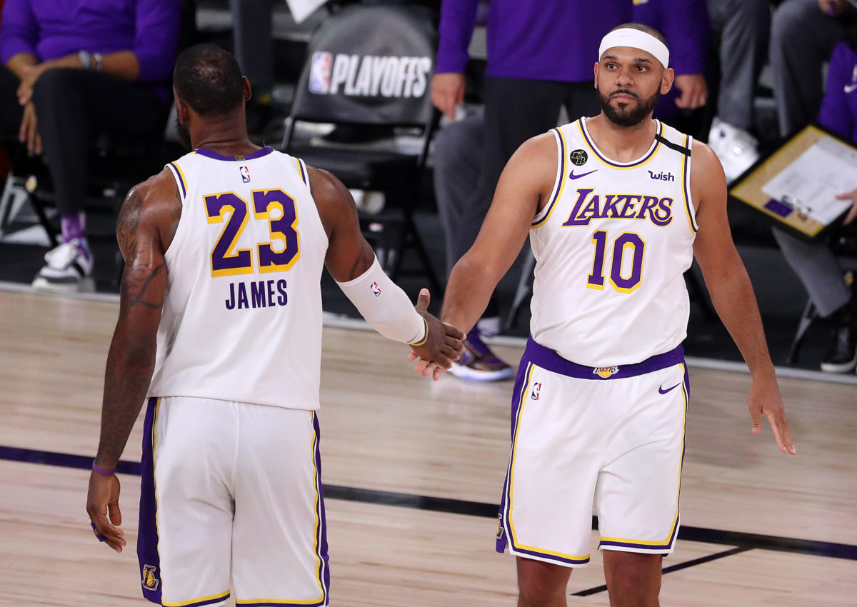 LeBron James and Jared Dudley of the Los Angeles Lakers dap up.