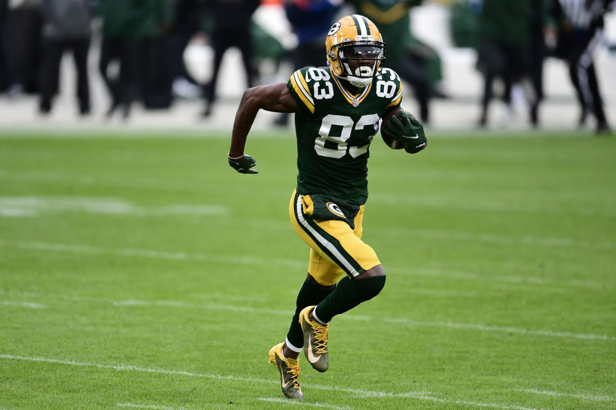 Packers WR Marquez Valdes-Scantling #83 of the Green Bay Packers runs for yards during a game