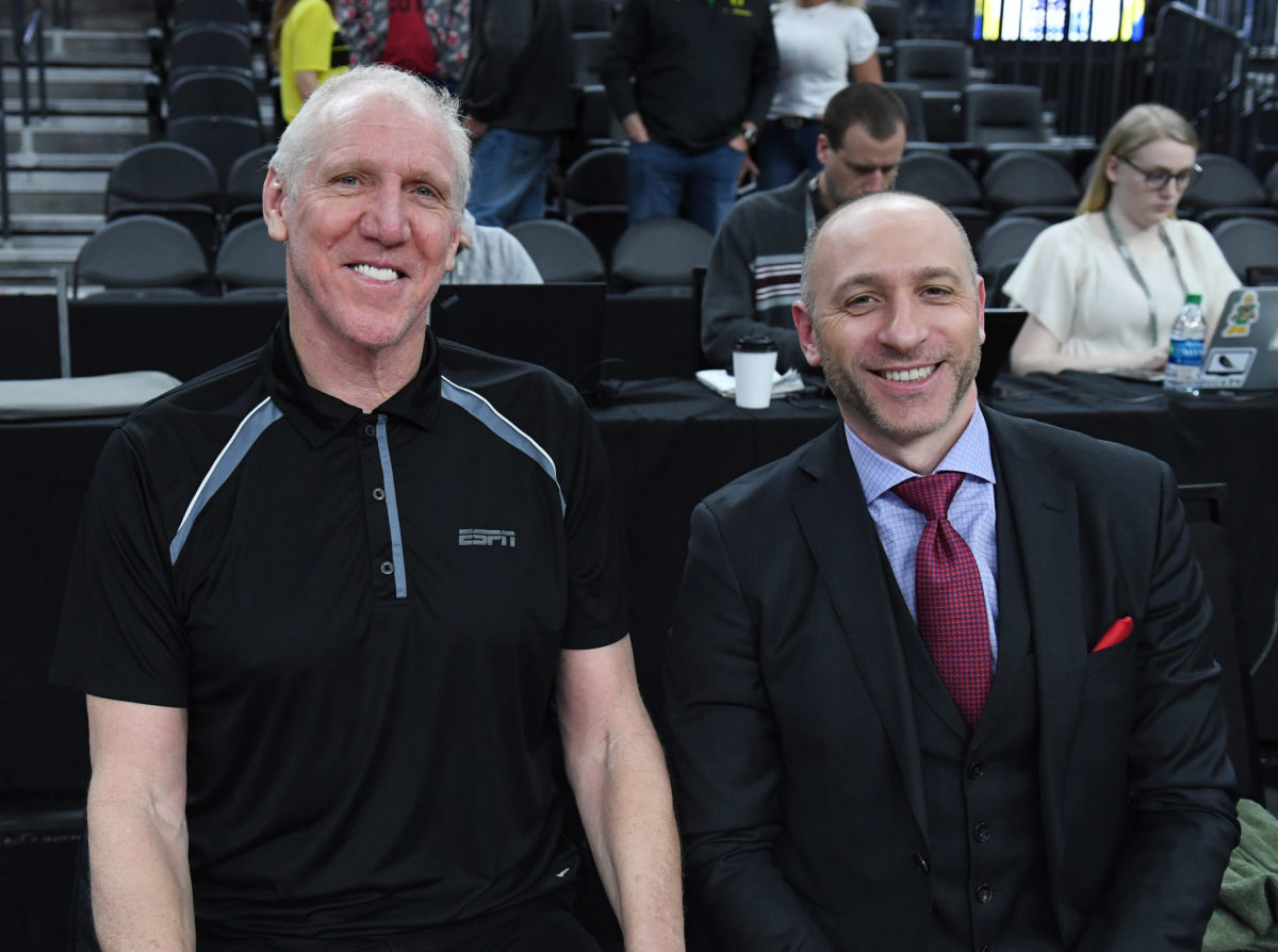 Bill Walton and Dave Pasch posing for a picture together before a game.