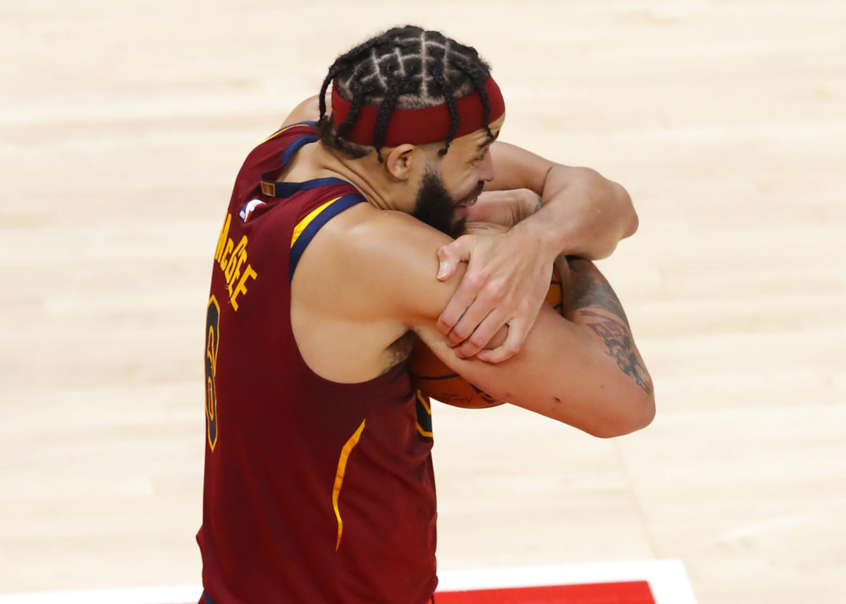 JaVale Mcgee hugging the basketball