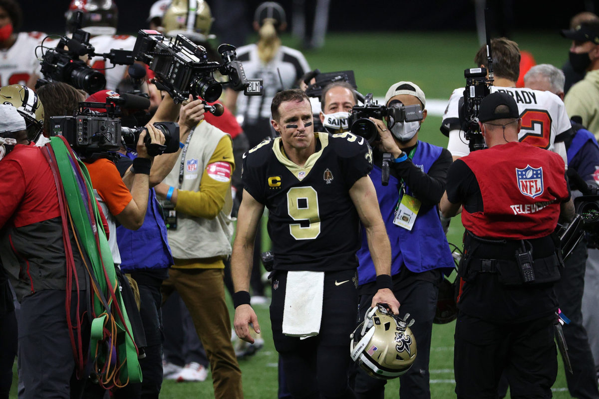Drew Brees walks off the field for the final time.