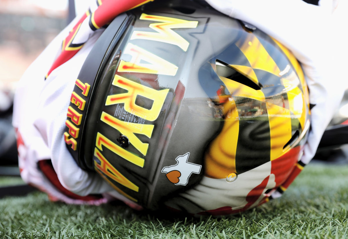 A closeup of a Maryland Terrapins football helmet.