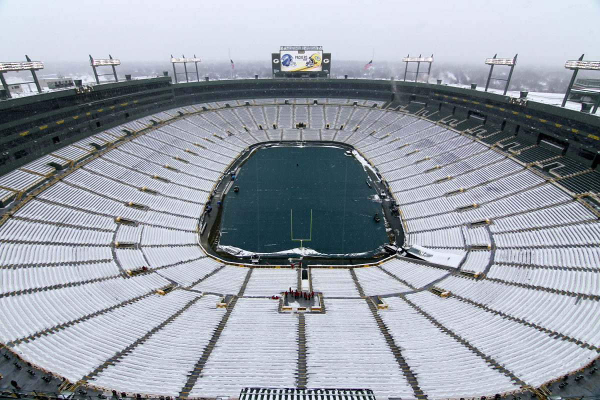Lambeau Field is covered in snow on Sunday.