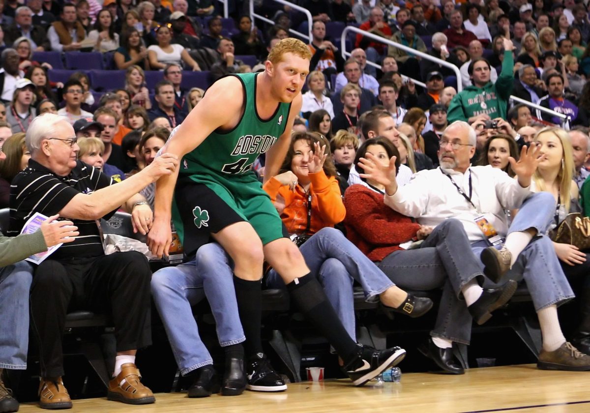 Brian Scalabrine falling into the crowd at a Celtics game.