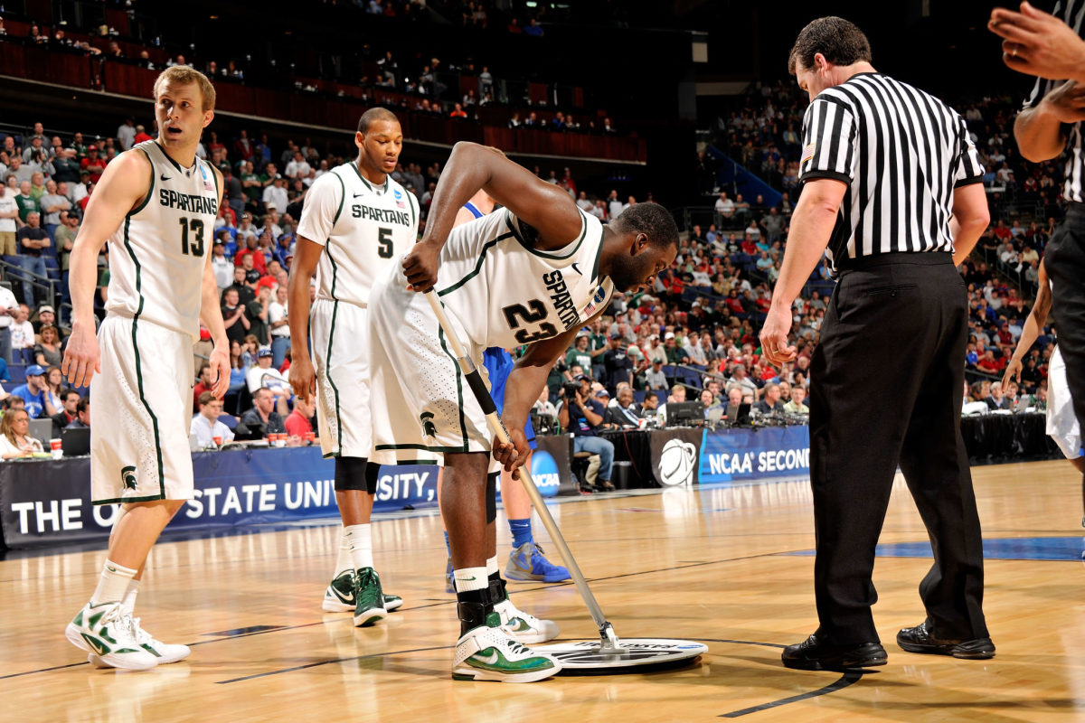 Draymond Green mopping up the floor during a Michigan State game.