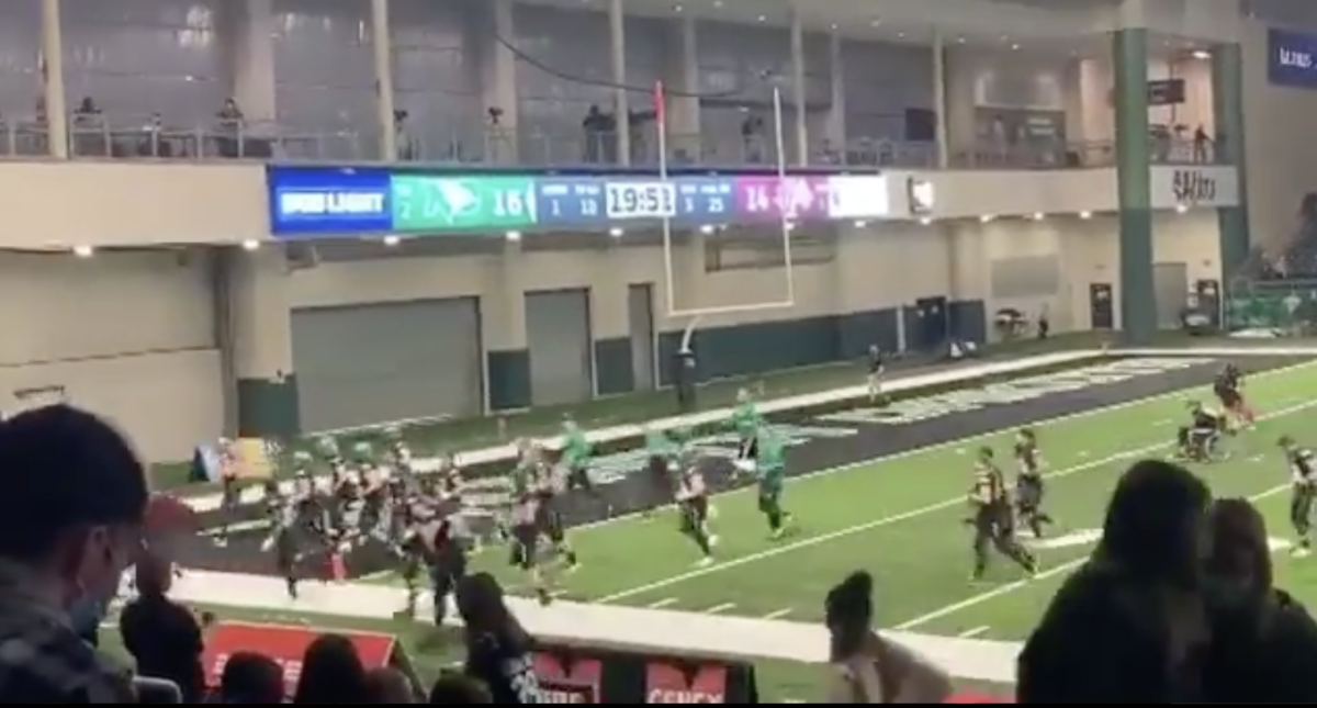 North Dakota football players run into the tunnel during a spring FCS football game.