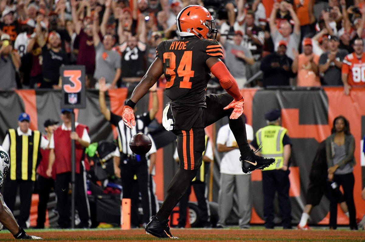 Carlos Hyde celebrates after a play.