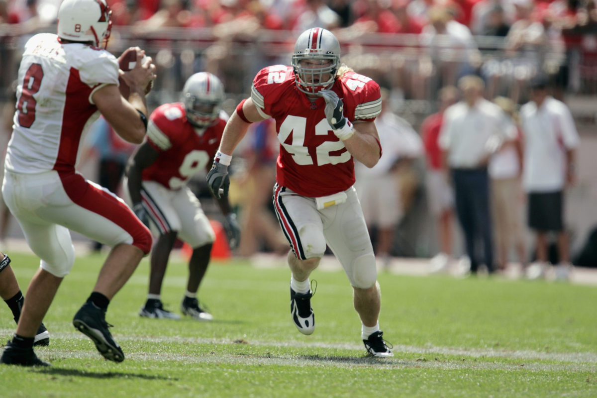 Bobby Carpenter chases the quarterback in a game for Ohio State.
