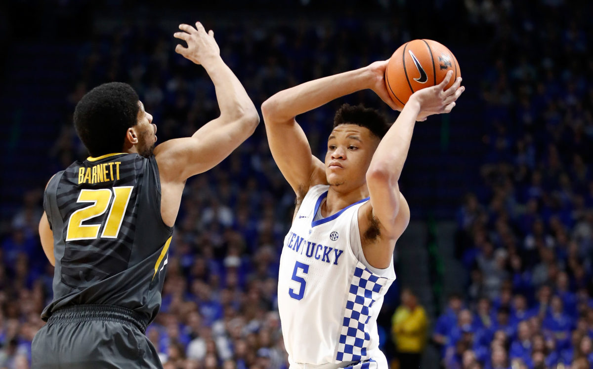 Kevin Knox holding the basketball above his head against Missouri.