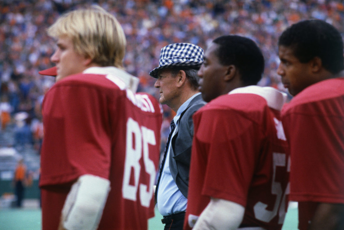 Bear Bryant coaches at Alabama back in the day.