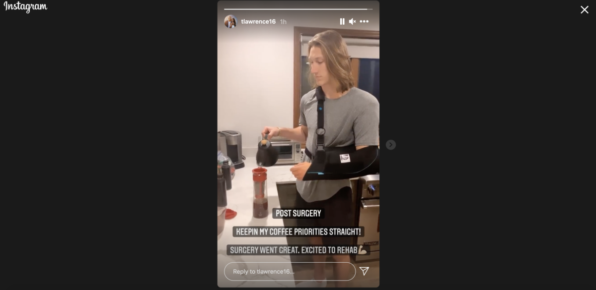 Trevor Lawrence in a sling after surgery.