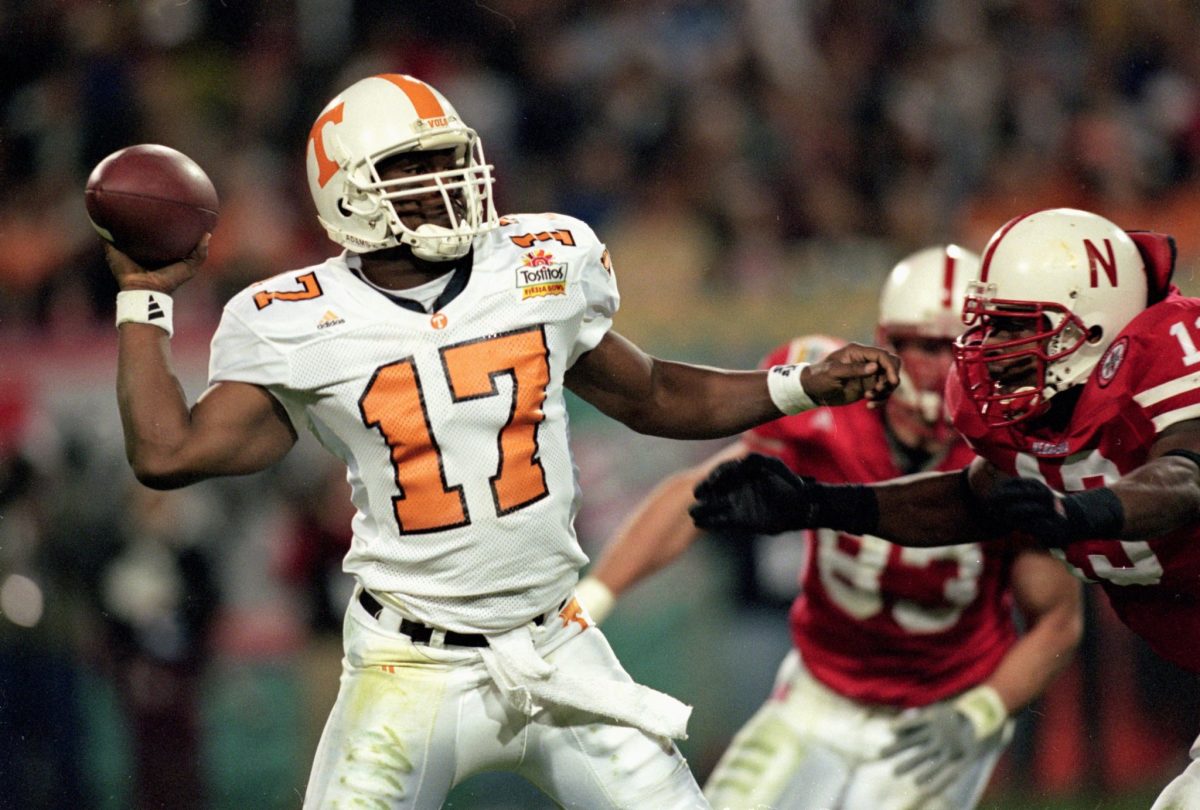 Tennessee football's Tee Martin throws a pass during a bowl game in 2000 against Nebraska.