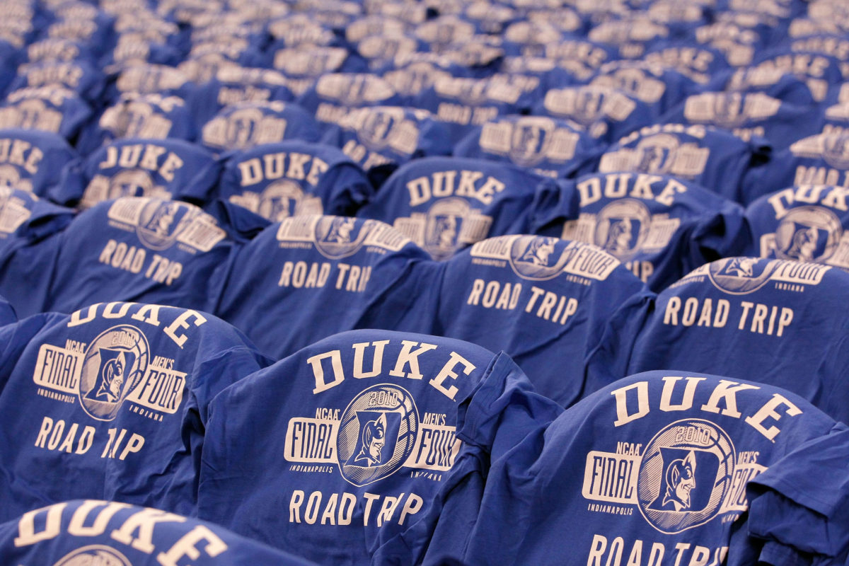 Duke t-shirts sit on chairs before game.